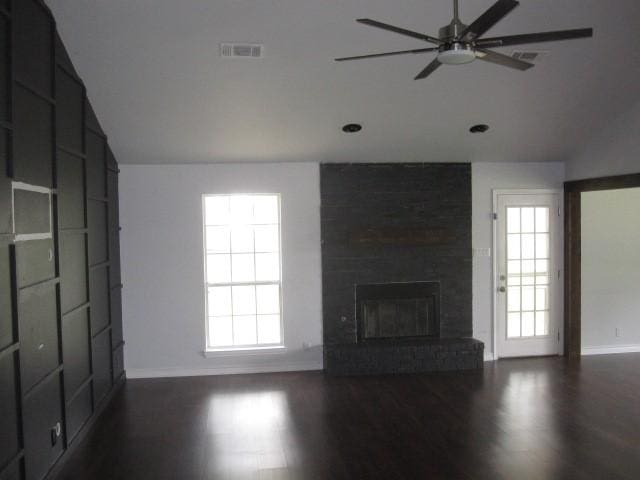 101 Ginger Dr, Pottsboro, TX 75076 - unfurnished living room featuring lofted ceiling, ceiling fan, baseboards, wood finished floors, and a brick fireplace