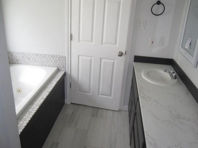 101 Ginger Dr, Pottsboro, TX 75076 - full bathroom with vanity and a whirlpool tub