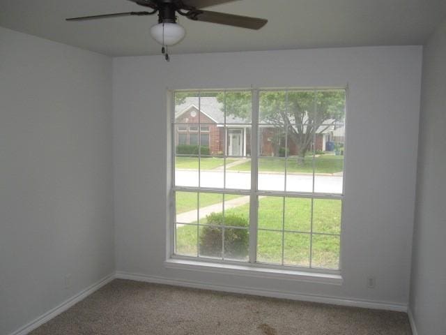 101 Ginger Dr, Pottsboro, TX 75076 - unfurnished room featuring healthy amount of natural light and a ceiling fan