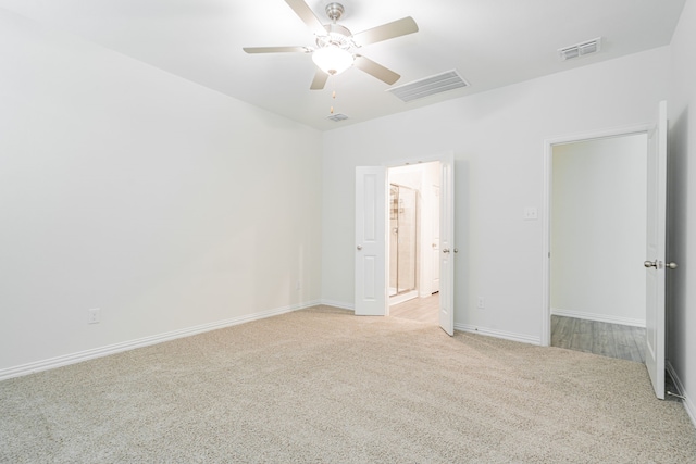624 Beltrand Ln, Fate, TX 75087 - unfurnished bedroom featuring light colored carpet, baseboards, and ceiling fan