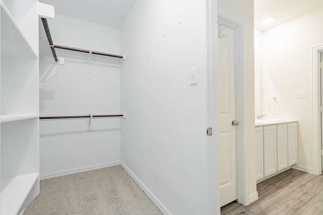 624 Beltrand Ln, Fate, TX 75087 - spacious closet featuring a sink