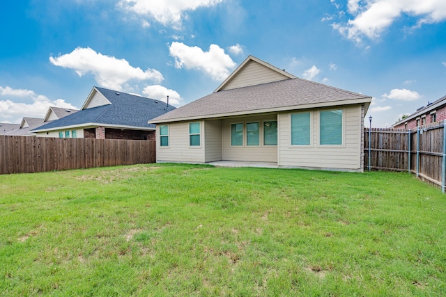 624 Beltrand Ln, Fate, TX 75087 - back of house featuring roof with shingles and a patio