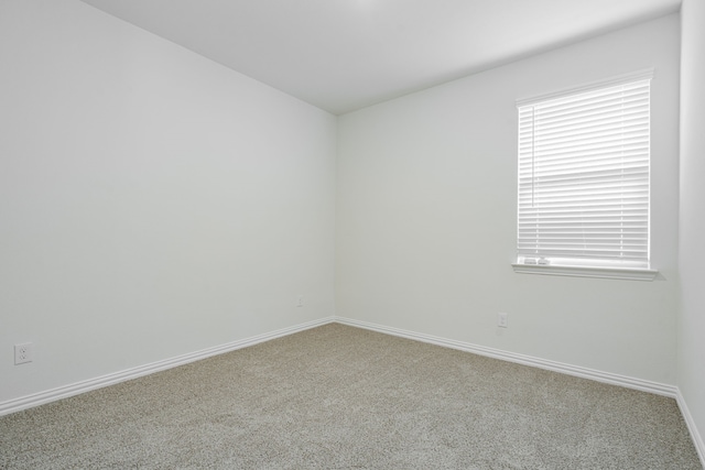 624 Beltrand Ln, Fate, TX 75087 - empty room featuring carpet floors and baseboards