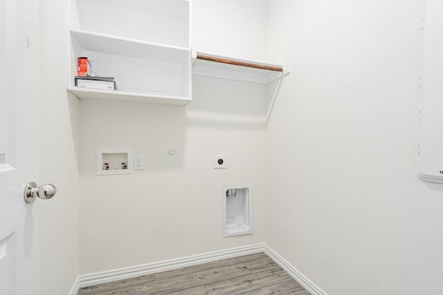 624 Beltrand Ln, Fate, TX 75087 - laundry room featuring washer hookup, electric dryer hookup, light wood finished floors, baseboards, and gas dryer hookup