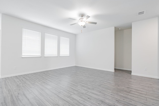 624 Beltrand Ln, Fate, TX 75087 - unfurnished room featuring ceiling fan, light wood-style flooring, and baseboards