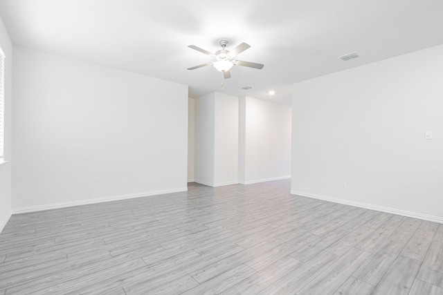 624 Beltrand Ln, Fate, TX 75087 - spare room with ceiling fan, light wood finished floors, baseboards, and recessed lighting