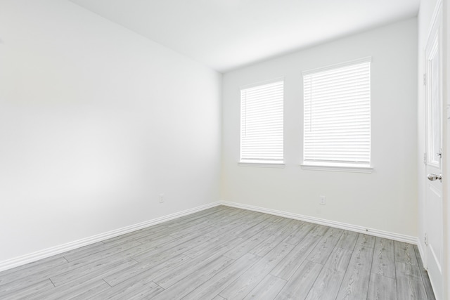 624 Beltrand Ln, Fate, TX 75087 - spare room featuring light wood-style flooring and baseboards