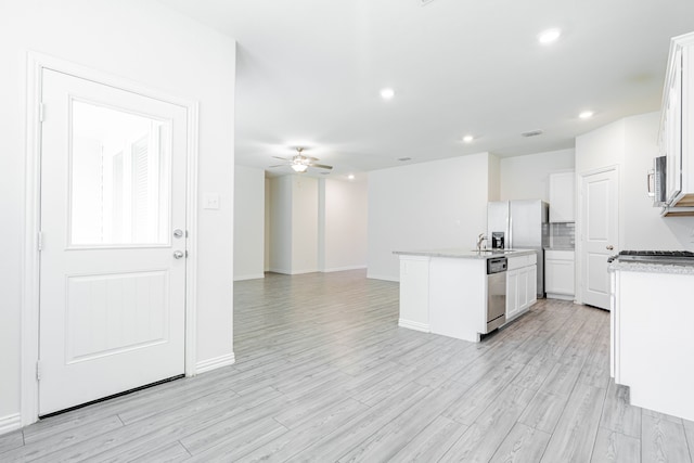 624 Beltrand Ln, Fate, TX 75087 - kitchen featuring a ceiling fan, stainless steel dishwasher, recessed lighting, white cabinetry, and a center island with sink