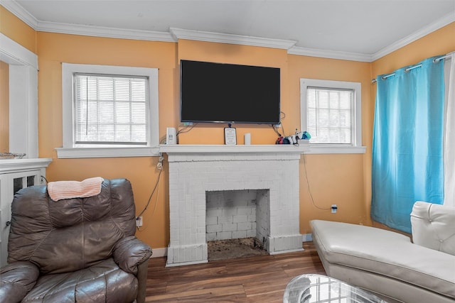 1815 Proctor Ave, Waco, TX 76708 - living area with a fireplace, wood finished floors, ornamental molding, and baseboards