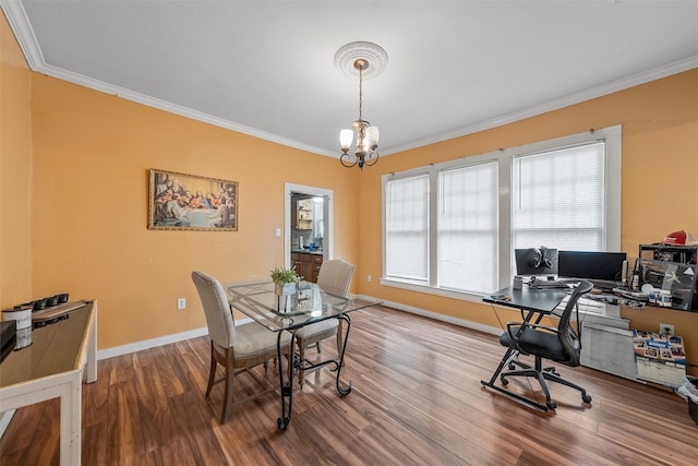 1815 Proctor Ave, Waco, TX 76708 - office area featuring crown molding, wood finished floors, a chandelier, and baseboards