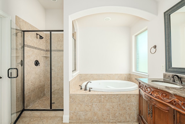 11048 Fernbury Dr, Fort Worth, TX 76179 - bathroom with a garden tub, vanity, a stall shower, and tile patterned flooring