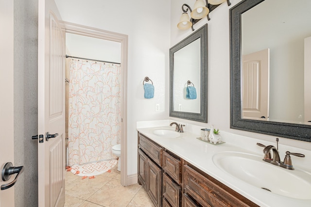 11048 Fernbury Dr, Fort Worth, TX 76179 - bathroom with toilet, double vanity, curtained shower, and tile patterned flooring