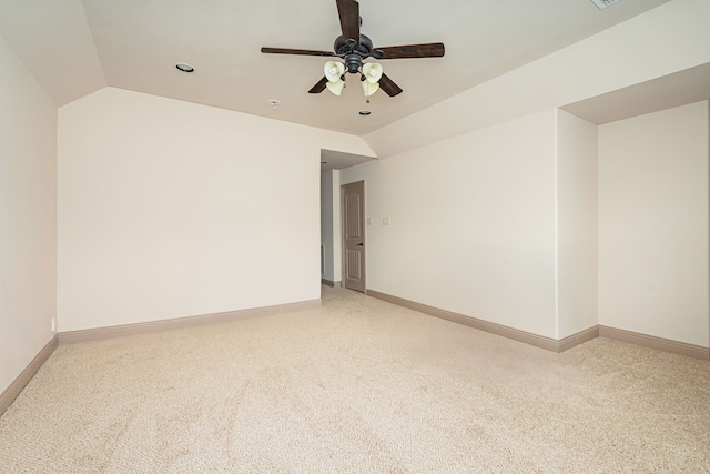 11048 Fernbury Dr, Fort Worth, TX 76179 - spare room with light colored carpet, a ceiling fan, baseboards, and vaulted ceiling