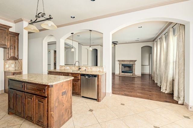 11048 Fernbury Dr, Fort Worth, TX 76179 - kitchen featuring stainless steel dishwasher, a sink, light tile patterned flooring, decorative backsplash, and recessed lighting