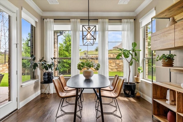 3480 Newport Dr, Prosper, TX 75078 - sunroom with baseboards, ornamental molding, healthy amount of natural light, and wood finished floors