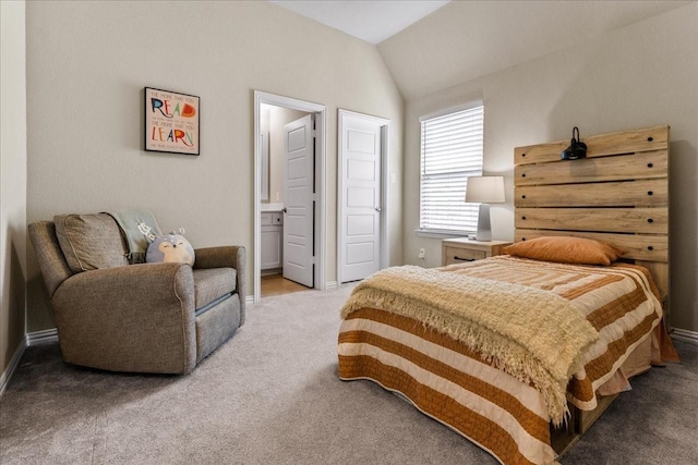 3480 Newport Dr, Prosper, TX 75078 - carpeted bedroom with lofted ceiling, ensuite bath, and baseboards