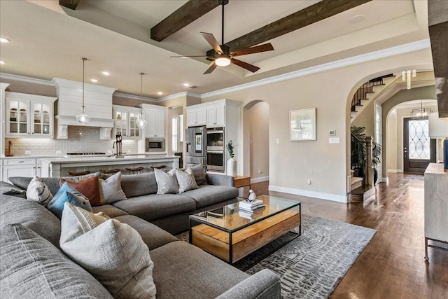 3480 Newport Dr, Prosper, TX 75078 - living area with arched walkways, baseboards, ornamental molding, recessed lighting, and ceiling fan