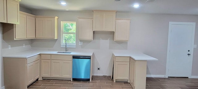 4017 Pickett St, Greenville, TX 75401 - kitchen featuring dishwashing machine, wood tiled floors, recessed lighting, a sink, and baseboards