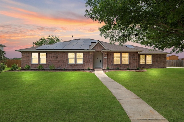 1036 Ridgetop Dr, Justin, TX 76247 - single story home with solar panels, brick siding, and roof with shingles