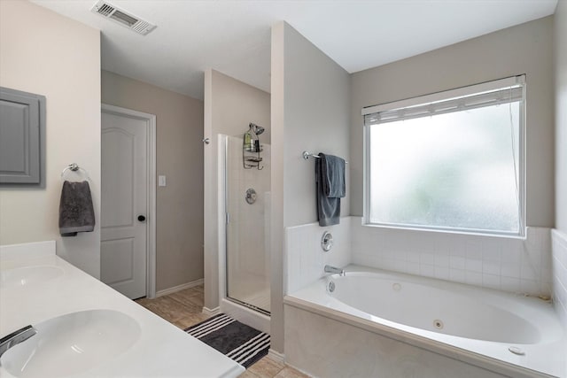 1036 Ridgetop Dr, Justin, TX 76247 - full bath featuring a whirlpool tub, a stall shower, and double vanity
