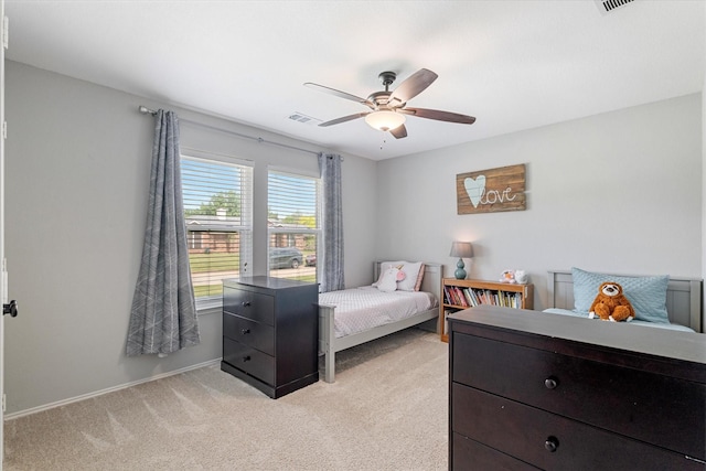 1036 Ridgetop Dr, Justin, TX 76247 - bedroom featuring light colored carpet, a ceiling fan, and baseboards