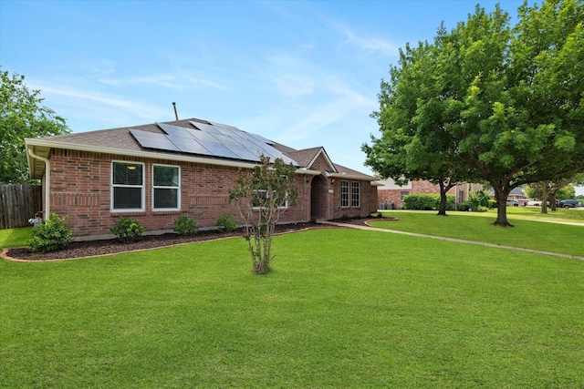 1036 Ridgetop Dr, Justin, TX 76247 - ranch-style home with solar panels, brick siding, and a shingled roof