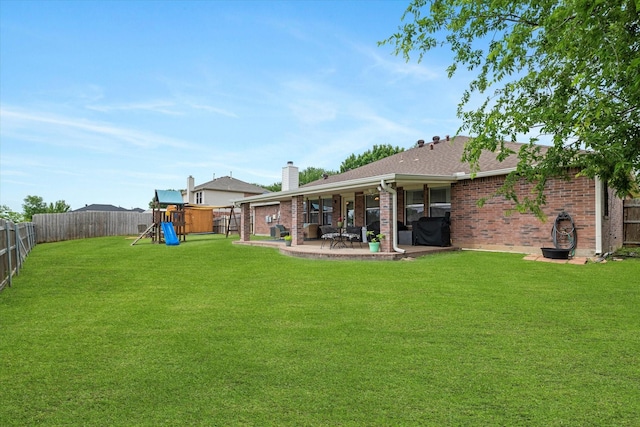 1036 Ridgetop Dr, Justin, TX 76247 - view of yard with a playground and a patio