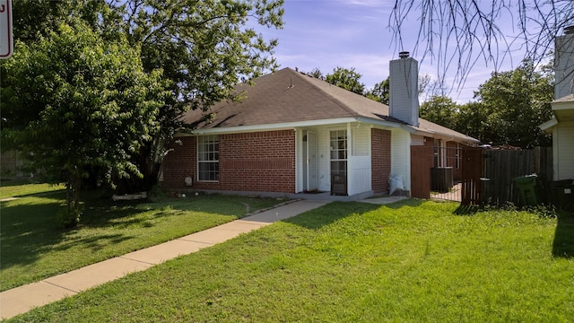 5323 Northridge Blvd, North Richland Hills, TX 76180 - view of front facade featuring brick siding and a chimney