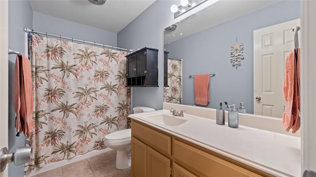 5323 Northridge Blvd, North Richland Hills, TX 76180 - bathroom with toilet, vanity, tile patterned flooring, and curtained shower