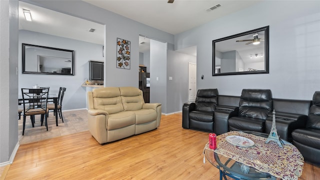 5323 Northridge Blvd, North Richland Hills, TX 76180 - living room featuring ceiling fan, light wood finished floors, and baseboards