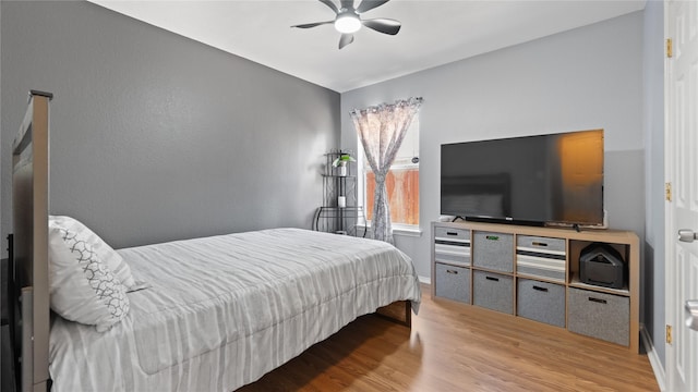 5323 Northridge Blvd, North Richland Hills, TX 76180 - bedroom featuring wood finished floors, baseboards, and ceiling fan