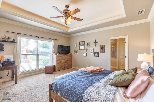 602 Prosperity Rd, Abilene, TX 79602 - bedroom featuring a tray ceiling, ornamental molding, carpet, and ceiling fan
