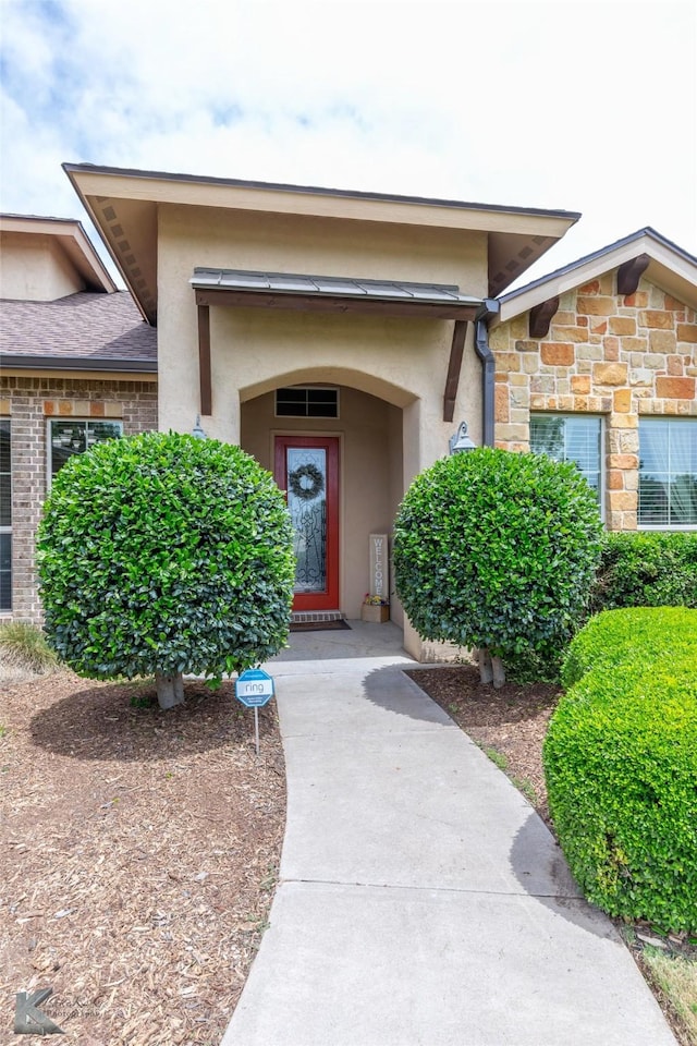 602 Prosperity Rd, Abilene, TX 79602 - property entrance with stucco siding and stone siding