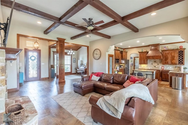 602 Prosperity Rd, Abilene, TX 79602 - living room featuring decorative columns, coffered ceiling, arched walkways, beamed ceiling, and recessed lighting