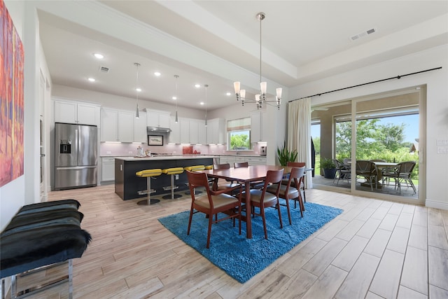 11017 Cartwright Dr, Denton, TX 76207 - dining space featuring light wood-style flooring, recessed lighting, and a chandelier