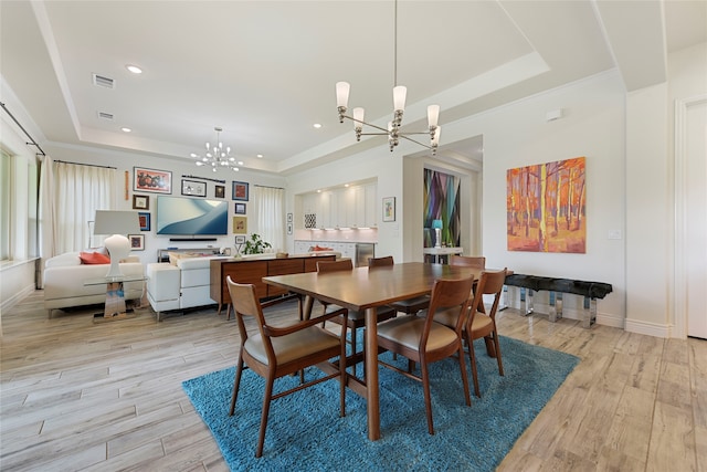11017 Cartwright Dr, Denton, TX 76207 - dining room featuring a tray ceiling, a chandelier, light wood-style floors, baseboards, and recessed lighting