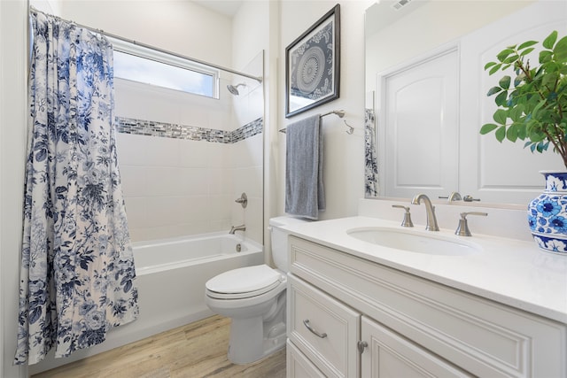 11017 Cartwright Dr, Denton, TX 76207 - bathroom with vanity, toilet, shower / tub combo, and wood finished floors