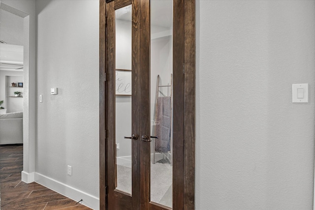 1007 Sinopa St, Caddo Mills, TX 75135 - hall with a textured wall, baseboards, dark wood-style floors, and french doors