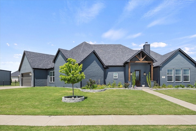 1007 Sinopa St, Caddo Mills, TX 75135 - view of front of home featuring a front yard, a chimney, a garage, and driveway