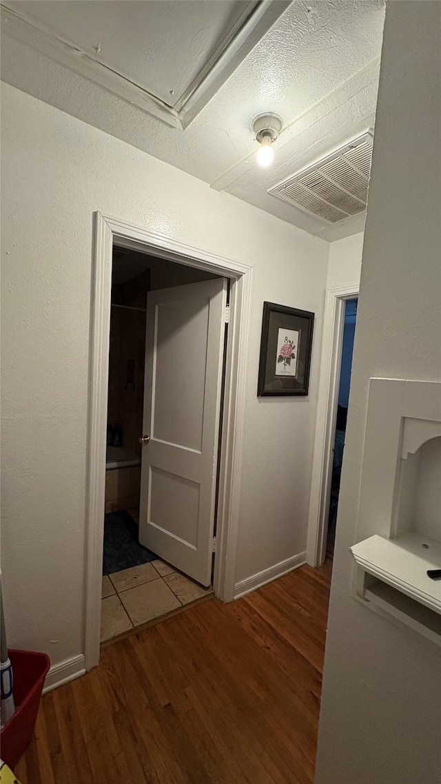 5632 Taylor Rd, River Oaks, TX 76114 - hallway with wood finished floors and baseboards