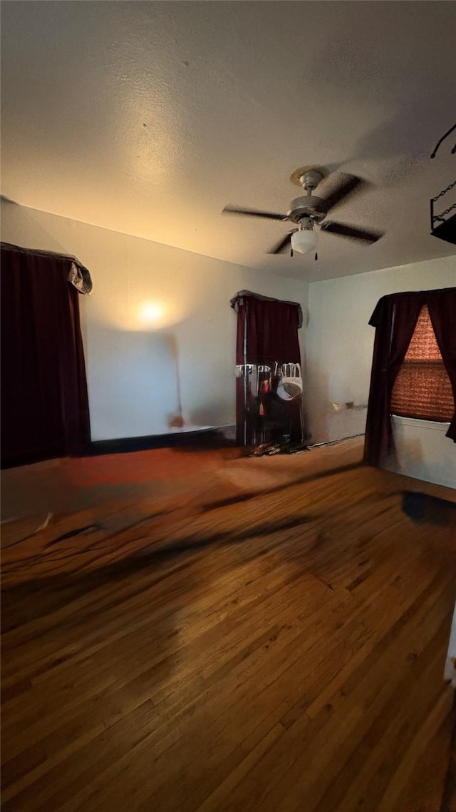 5632 Taylor Rd, River Oaks, TX 76114 - spare room with wood finished floors, ceiling fan, and a textured ceiling