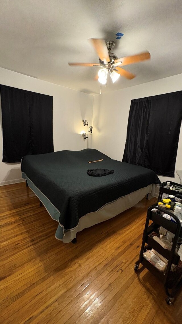 5632 Taylor Rd, River Oaks, TX 76114 - bedroom with hardwood / wood-style flooring and a ceiling fan