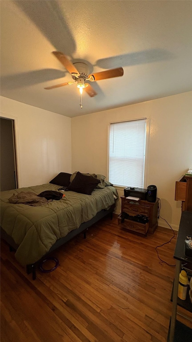 5632 Taylor Rd, River Oaks, TX 76114 - bedroom featuring wood finished floors, ceiling fan, and a textured ceiling