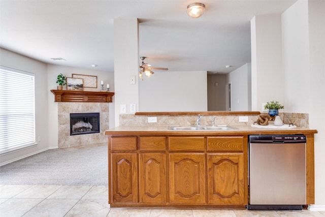 2600 Spencer Cir, Royse City, TX 75189 - kitchen featuring dishwasher, a sink, ceiling fan, brown cabinets, and open floor plan