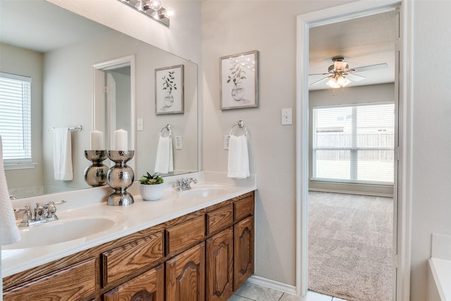2600 Spencer Cir, Royse City, TX 75189 - bathroom featuring double vanity, ceiling fan, and tile patterned flooring