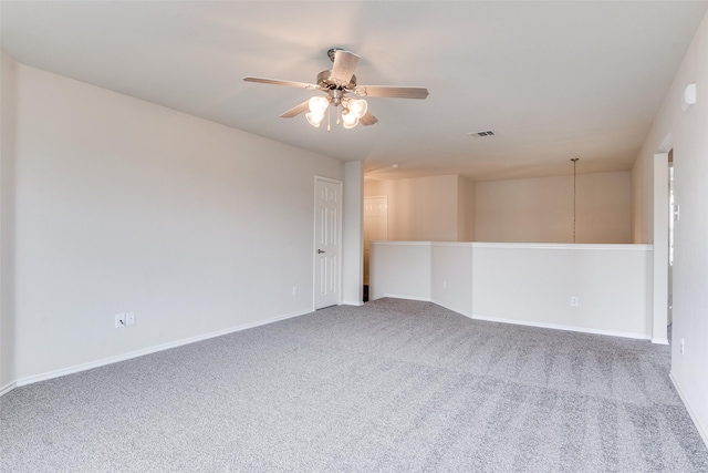 2600 Spencer Cir, Royse City, TX 75189 - spare room with a ceiling fan, carpet floors, and baseboards