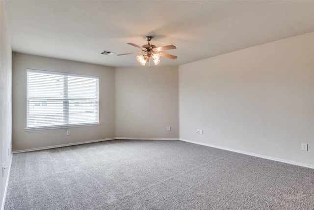2600 Spencer Cir, Royse City, TX 75189 - empty room featuring a ceiling fan, carpet floors, and baseboards