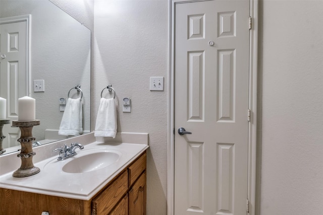 2600 Spencer Cir, Royse City, TX 75189 - bathroom featuring vanity and a textured wall
