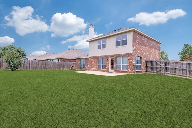 2600 Spencer Cir, Royse City, TX 75189 - rear view of house with a chimney, brick siding, and a patio area