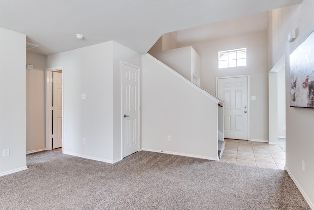 2600 Spencer Cir, Royse City, TX 75189 - foyer with light carpet, stairs, and baseboards